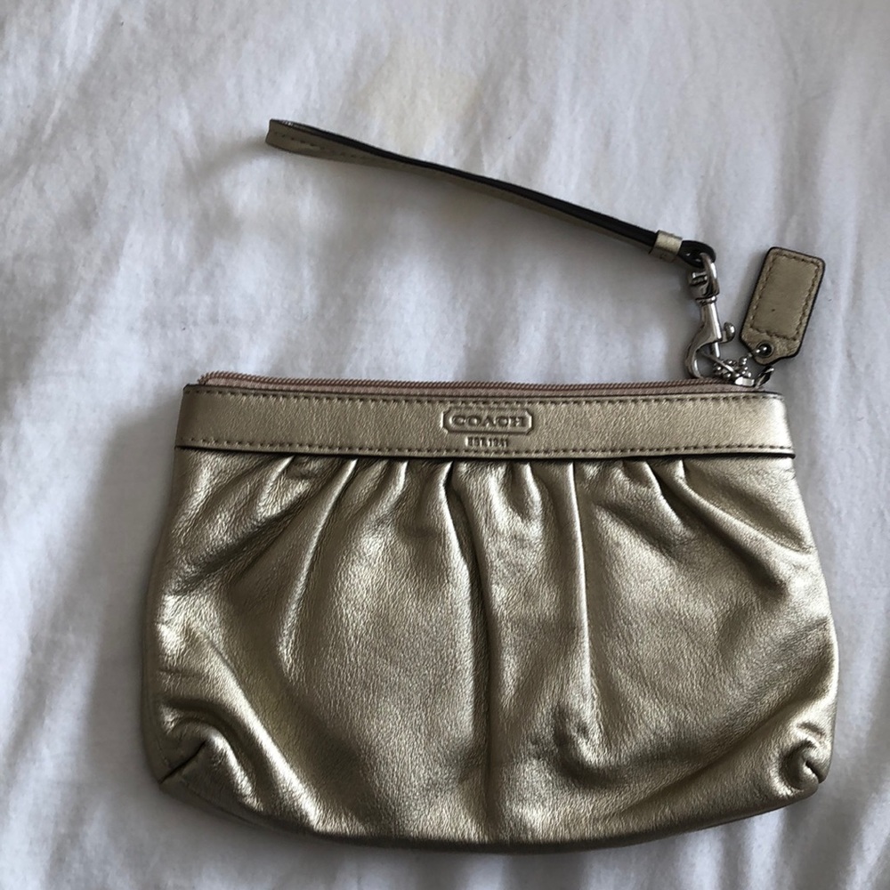EUC Coach metallic gold wristlet